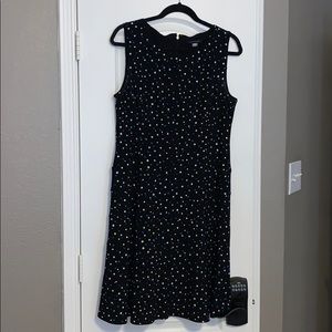 Sleeveless black with blue/white polka dot dress